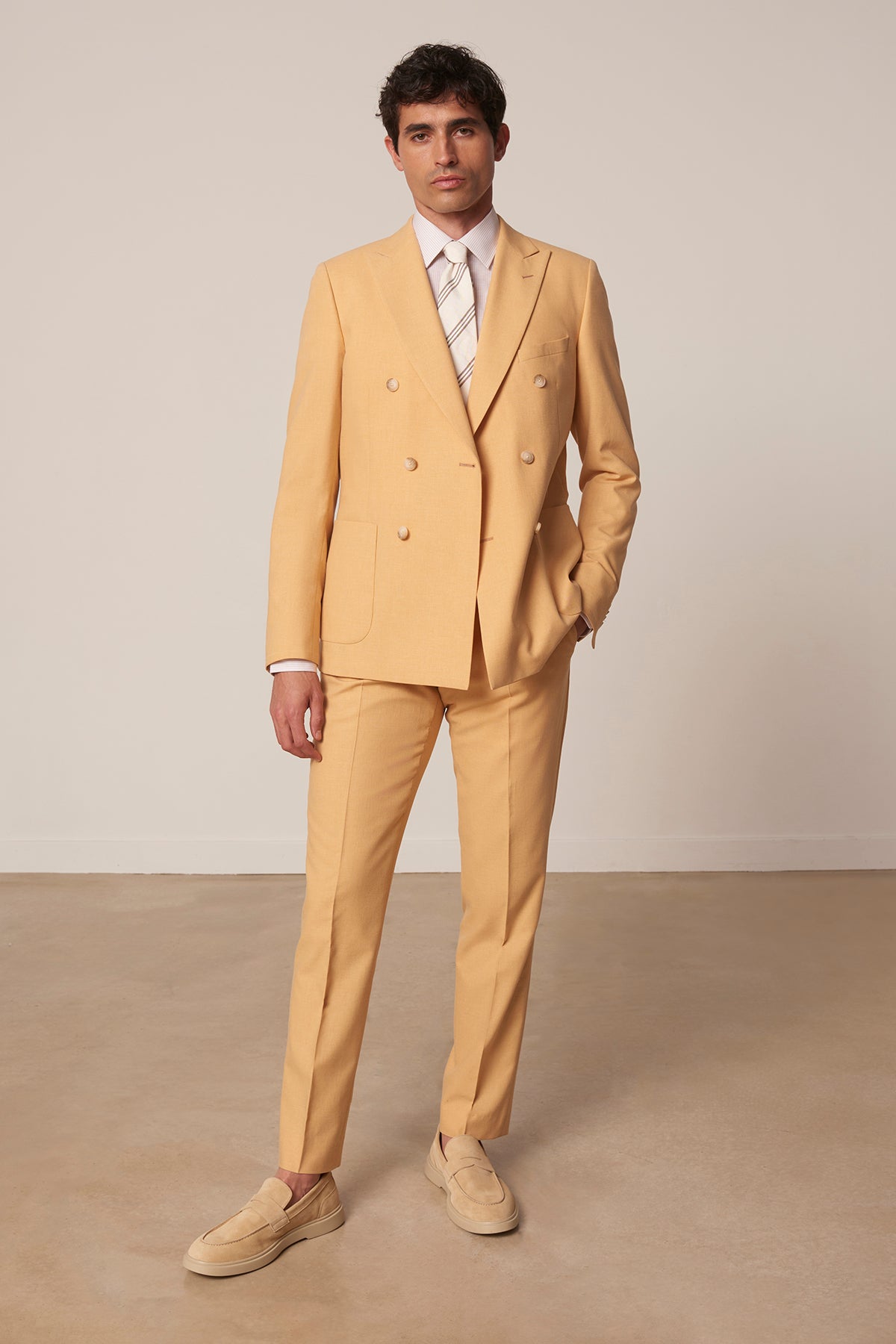 Girasol double-breasted suit in wool, cotton, and silk