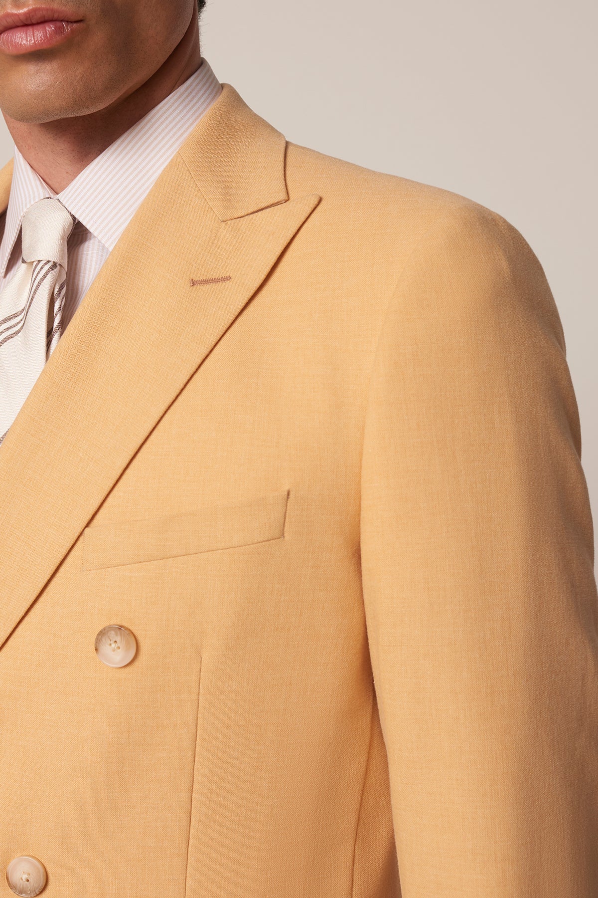 Girasol double-breasted suit in wool, cotton, and silk