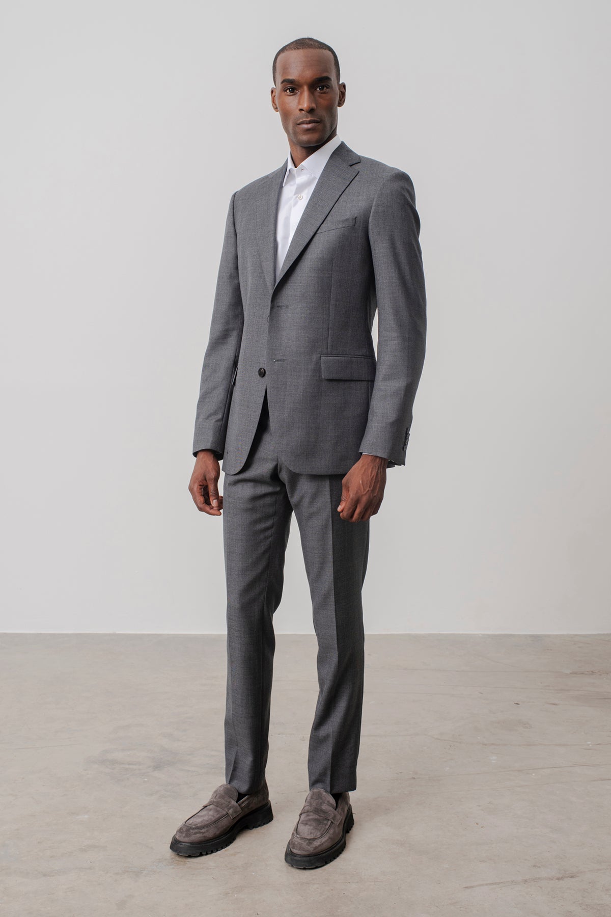 Costume droit Harry à motif prince de galles gris en laine vierge.