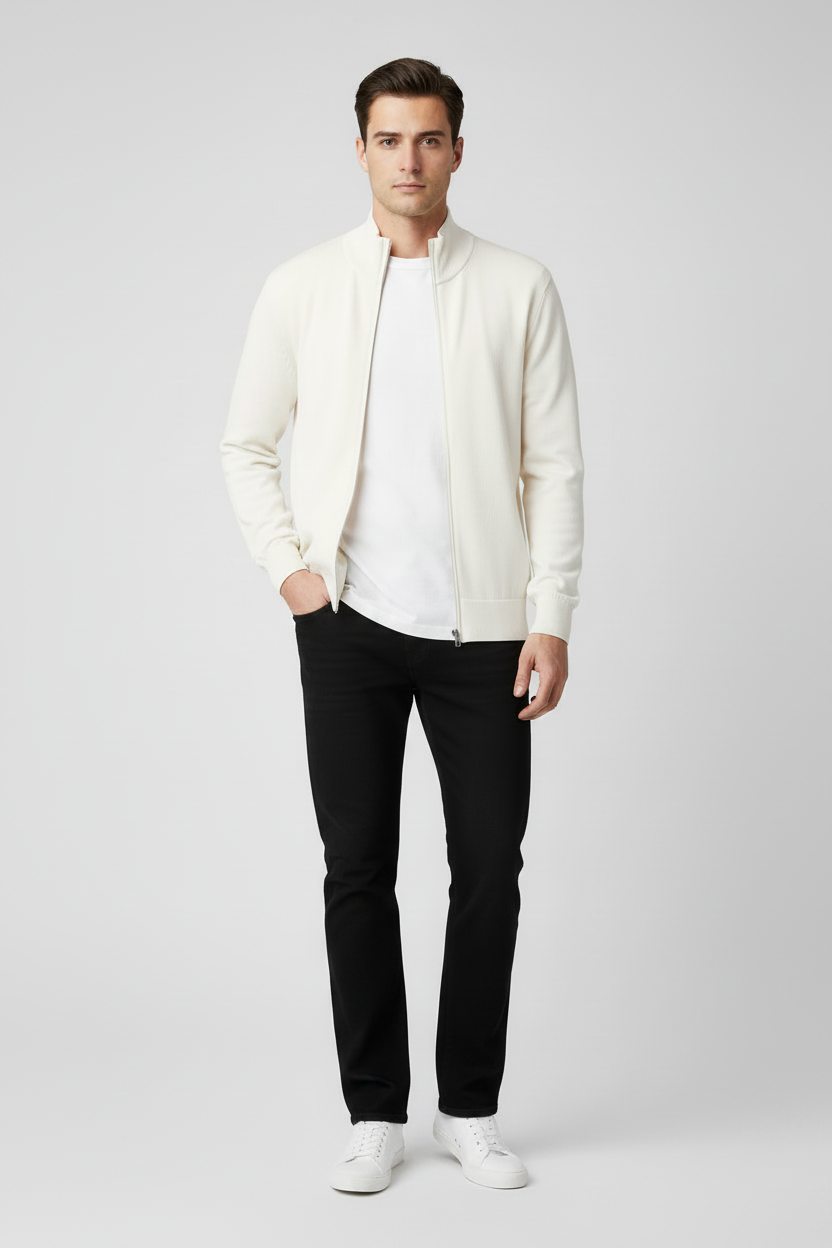 Look mannequin : cardigan zippé Dante ouvert sur un t-shirt blanc, avec jean noir coupe droite